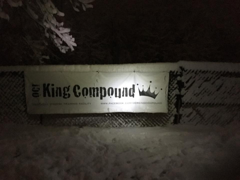 OCR racers tackling obstacles at event